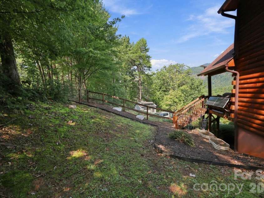 132 Falls View Trail, Lake Lure, NC 28746.  MLS# CAR4424804, YatesRealty ID 52610. Fenced yard