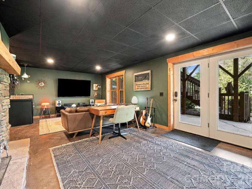 132 Falls View Trail, Lake Lure, NC 28746.  MLS# CAR4424804, YatesRealty ID 52610. Lower level living area