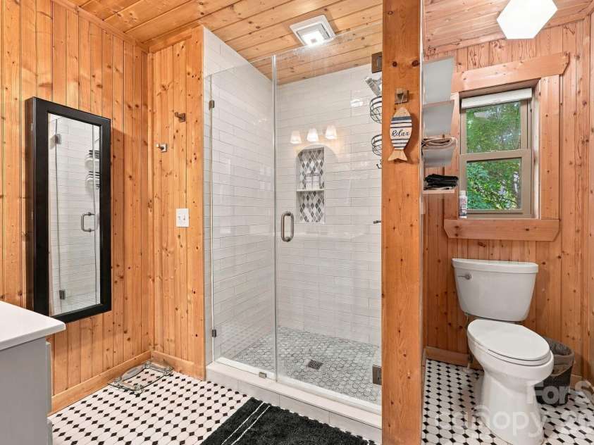 132 Falls View Trail, Lake Lure, NC 28746.  MLS# CAR4424804, YatesRealty ID 52610. Primary bath