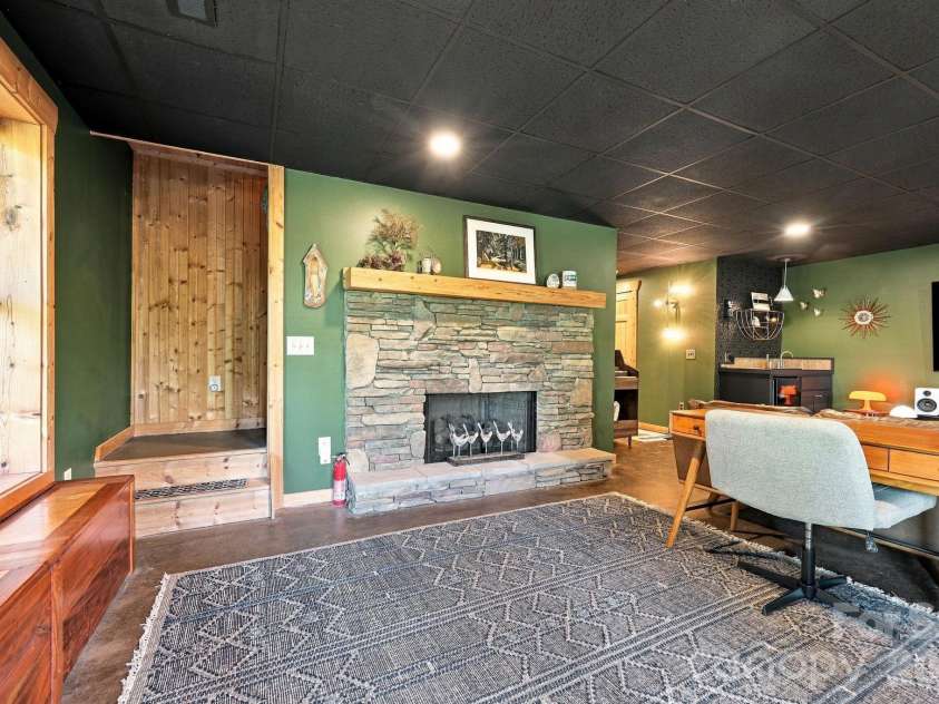 132 Falls View Trail, Lake Lure, NC 28746.  MLS# CAR4424804, YatesRealty ID 52610. Second fireplace