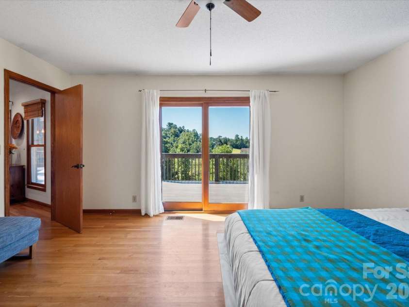47 Sams Road, Asheville, NC 28787.  MLS# CAR4425500, YatesRealty ID 52623. Opens up to the deck