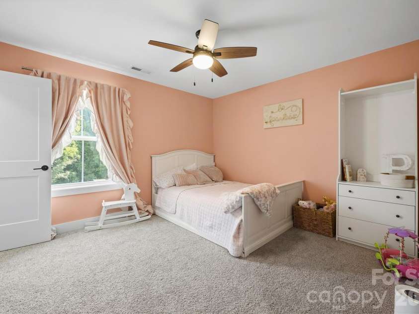 2665 Umberger Road, Cleveland, NC 27013.  MLS# CAR4425571, YatesRealty ID 52643. Bedroom 2 on upper level with walk in closet