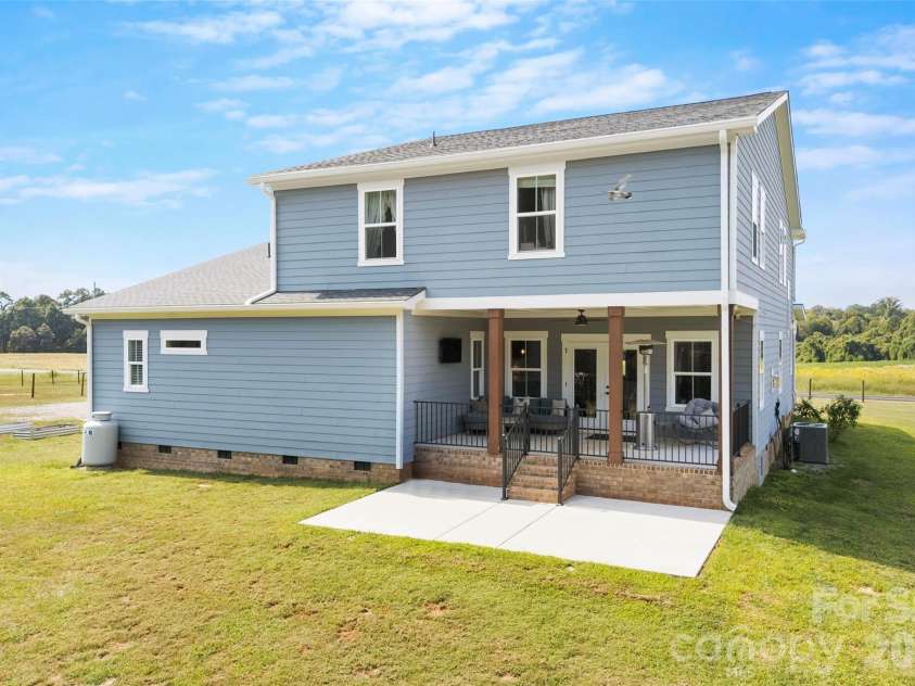 2665 Umberger Road, Cleveland, NC 27013.  MLS# CAR4425571, YatesRealty ID 52643. Covered back patio right off living room