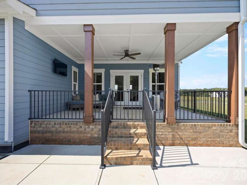 2665 Umberger Road, Cleveland, NC 27013.  MLS# CAR4425571, YatesRealty ID 52643. Extra concrete patio space off covered porch