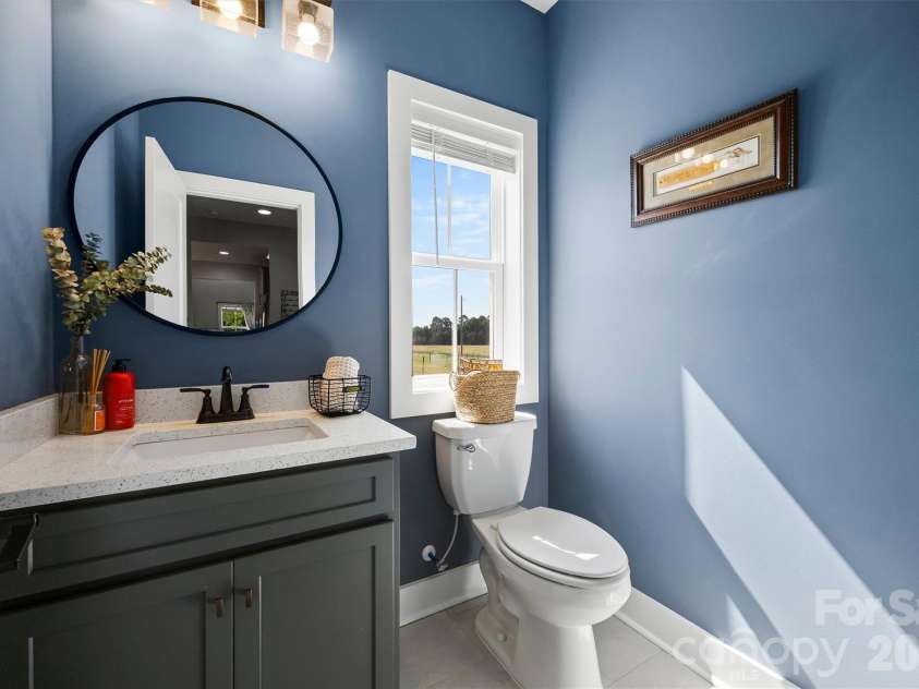 2665 Umberger Road, Cleveland, NC 27013.  MLS# CAR4425571, YatesRealty ID 52643. Half bath right off garage entrance