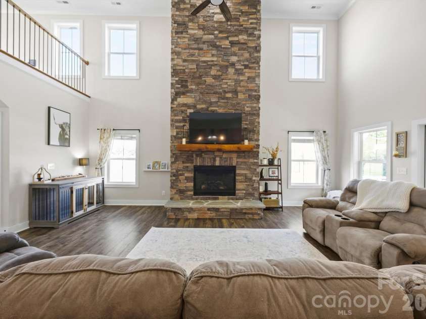 2665 Umberger Road, Cleveland, NC 27013.  MLS# CAR4425571, YatesRealty ID 52643. This floor to ceiling stone fireplace is the show stopper!