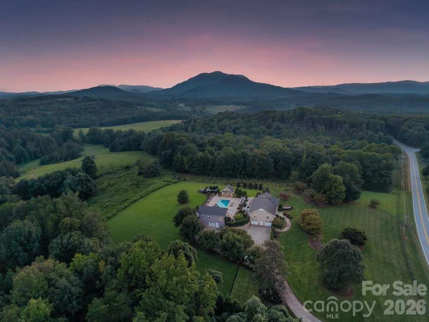 6320 NC Hwy 108 Highway, Mill Spring, NC 28756.  MLS# CAR4425892, YatesRealty ID 52647. Aerial View Twilight