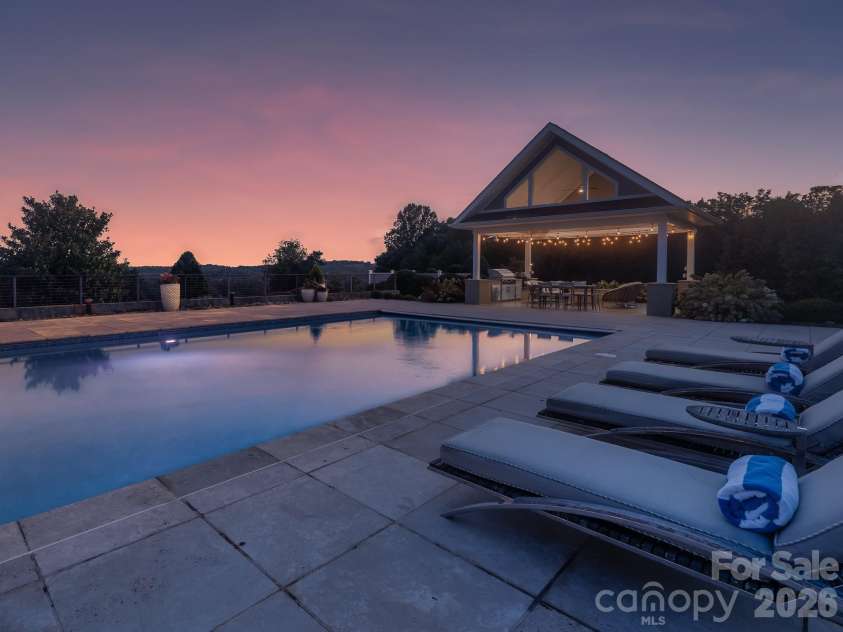 6320 NC Hwy 108 Highway, Mill Spring, NC 28756.  MLS# CAR4425892, YatesRealty ID 52647. Pergola Twilight
