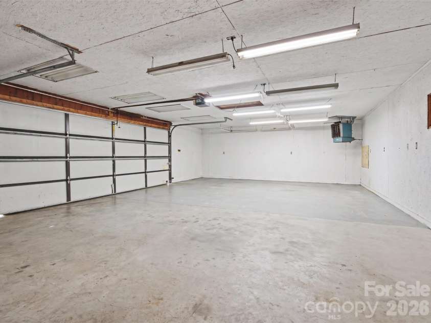 155 Park Villa Road, Salisbury, NC 28146.  MLS# CAR4397860, YatesRealty ID 5265. AI generated clean garage