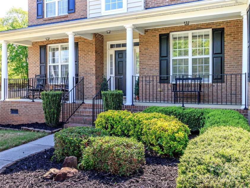 706 Springwood Drive, Waxhaw, NC 28173.  MLS# CAR4240663, YatesRealty ID 5265. Beautiful covered porch