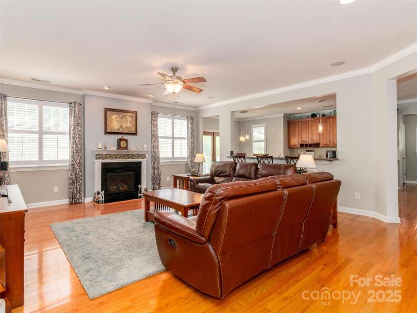 706 Springwood Drive, Waxhaw, NC 28173.  MLS# CAR4240663, YatesRealty ID 5265. Gleaming hardwoods and gas log fireplace