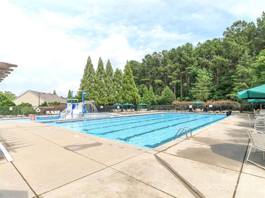706 Springwood Drive, Waxhaw, NC 28173.  MLS# CAR4240663, YatesRealty ID 5265. Wesley Oaks pool