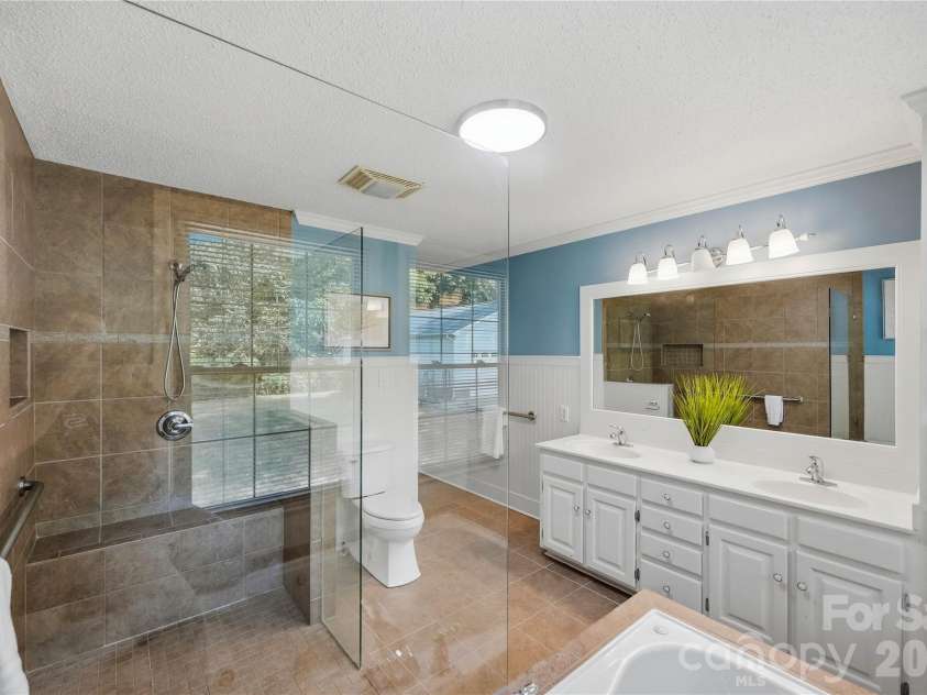 3007 Plentywood Drive, Matthews, NC 28105.  MLS# CAR4425834, YatesRealty ID 52650. Primary Bathroom