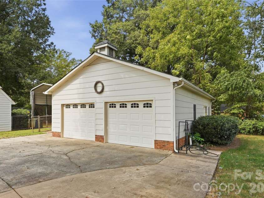 3007 Plentywood Drive, Matthews, NC 28105.  MLS# CAR4425834, YatesRealty ID 52650. Two-car Garage with Workshop