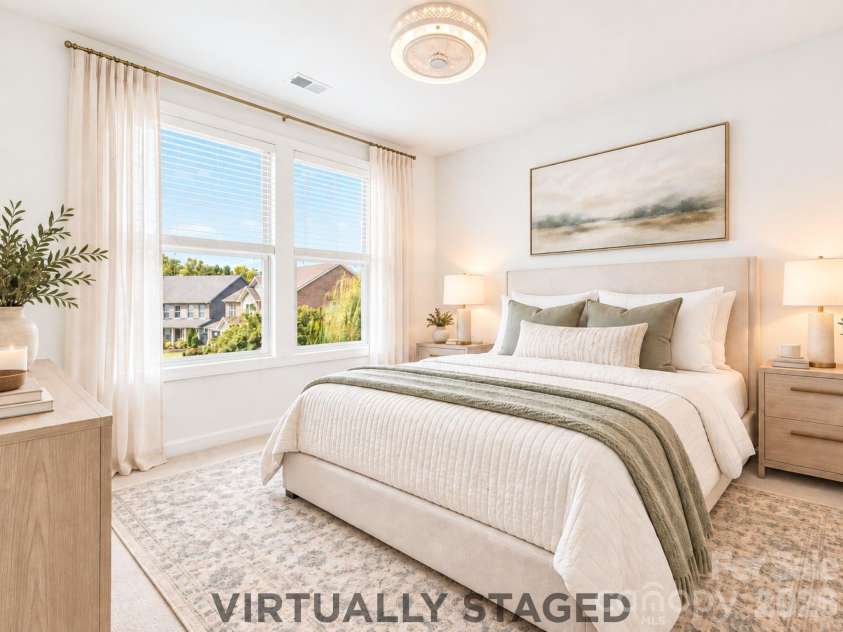 8315 Breton Way, Harrisburg, NC 28075.  MLS# CAR4426522, YatesRealty ID 52653. Virtually staged, this bright second-level bedroom becomes a peaceful retreat, complete with plenty of room for a full bedroom suite and easy access to the shared hall bathroom —an inviting space where a loved one can set