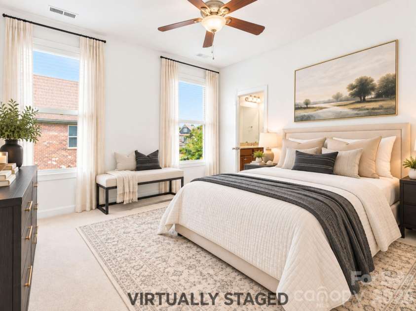 8315 Breton Way, Harrisburg, NC 28075.  MLS# CAR4426522, YatesRealty ID 52653. Virtually staged, this well-proportioned second-level bedroom offers ample space for a full bedroom suite and direct access to a shared full hall bathroom.