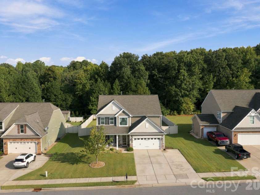 5857 McClintock Drive, Denver, NC 28037.  MLS# CAR4420442, YatesRealty ID 52659. Backs up to wooded area