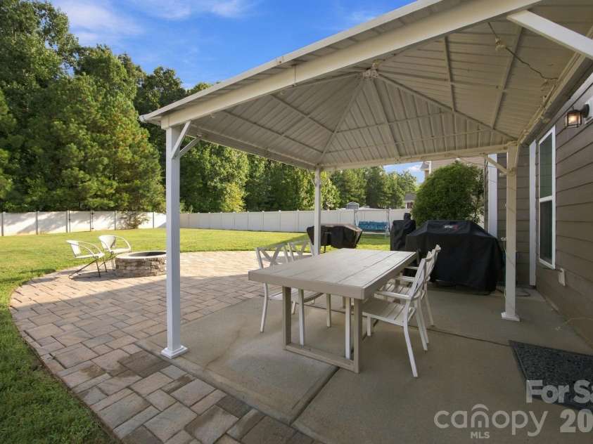 5857 McClintock Drive, Denver, NC 28037.  MLS# CAR4420442, YatesRealty ID 52659. Pergola over back patio