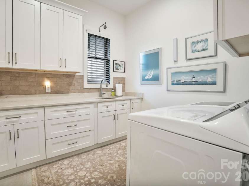 2039 Cane Creek Road, Fletcher, NC 28732.  MLS# CAR4424701, YatesRealty ID 52666. Laundry Room