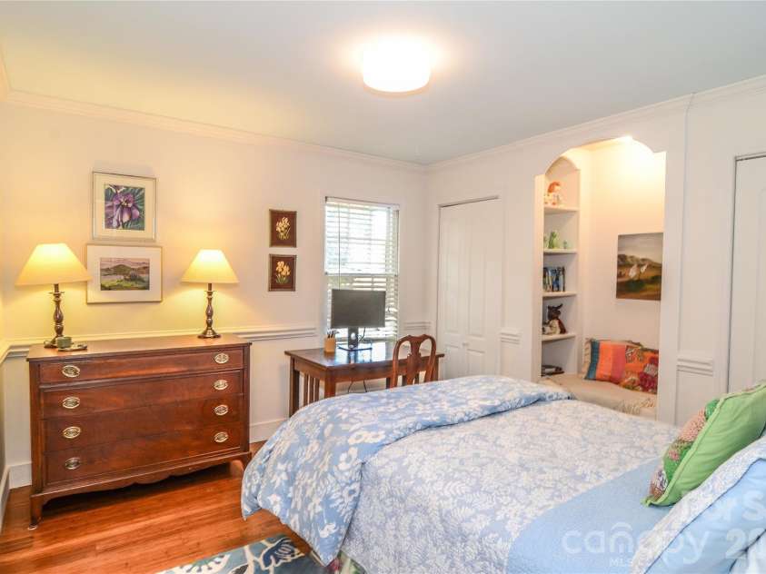 500 Laurel Fork Drive, Matthews, NC 28105.  MLS# CAR4424461, YatesRealty ID 52672. Bedroom 3 With Built in Reading Nook and Shelves