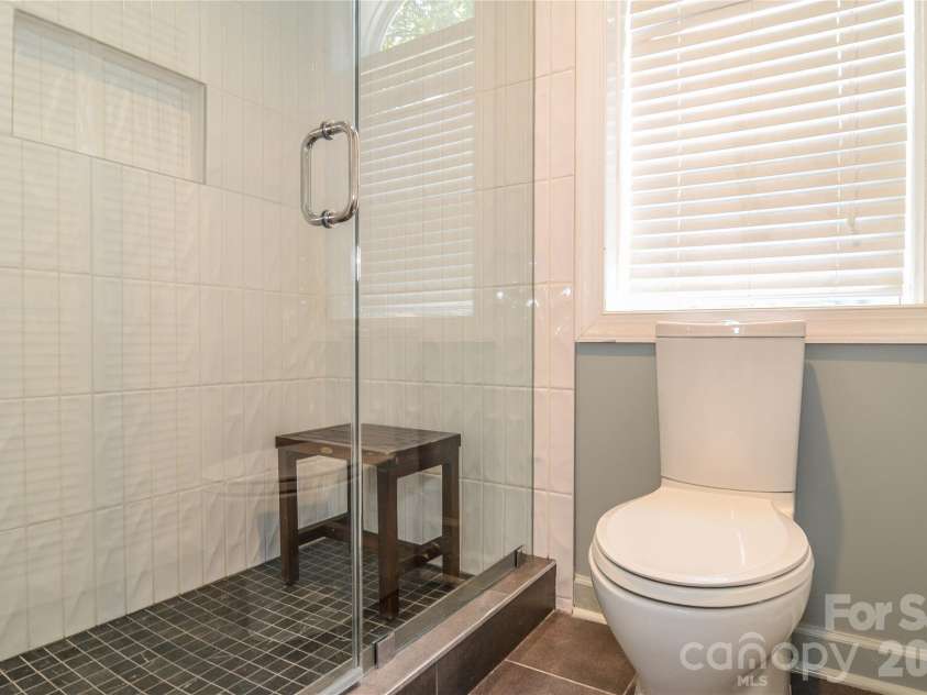 500 Laurel Fork Drive, Matthews, NC 28105.  MLS# CAR4424461, YatesRealty ID 52672. Primary Bathroom Suite With Second Linen Closet