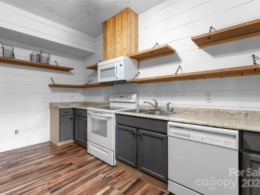 158 Glen Echo Lane, Hendersonville, NC 28739.  MLS# CAR4197828, YatesRealty ID 5268. Lower Level Kitchen