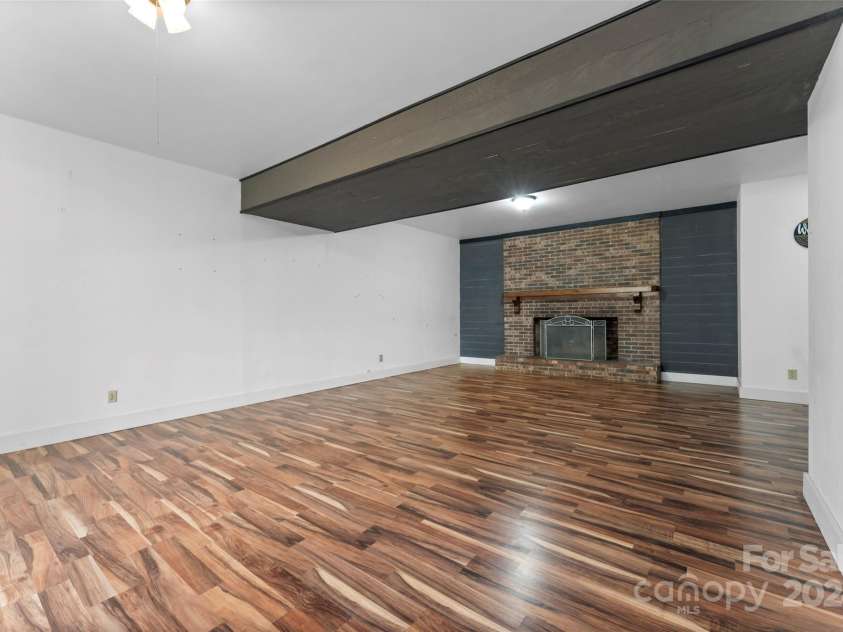 158 Glen Echo Lane, Hendersonville, NC 28739.  MLS# CAR4197828, YatesRealty ID 5268. Lower Level Livingroom