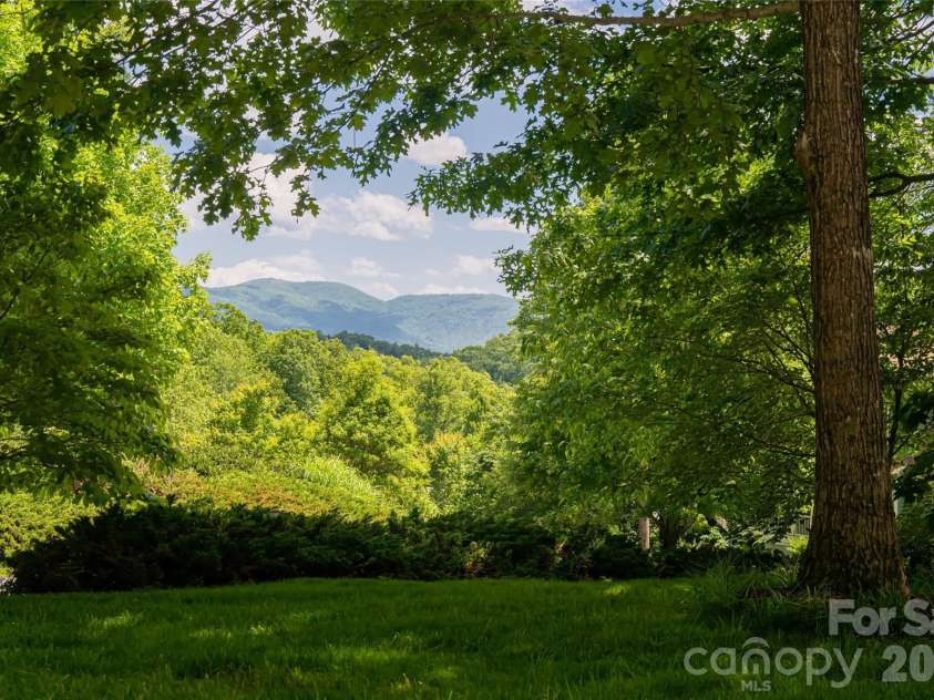 20 East Owl Creek Lane, Fairview, NC 28730.  MLS# CAR4258624, YatesRealty ID 5268. 