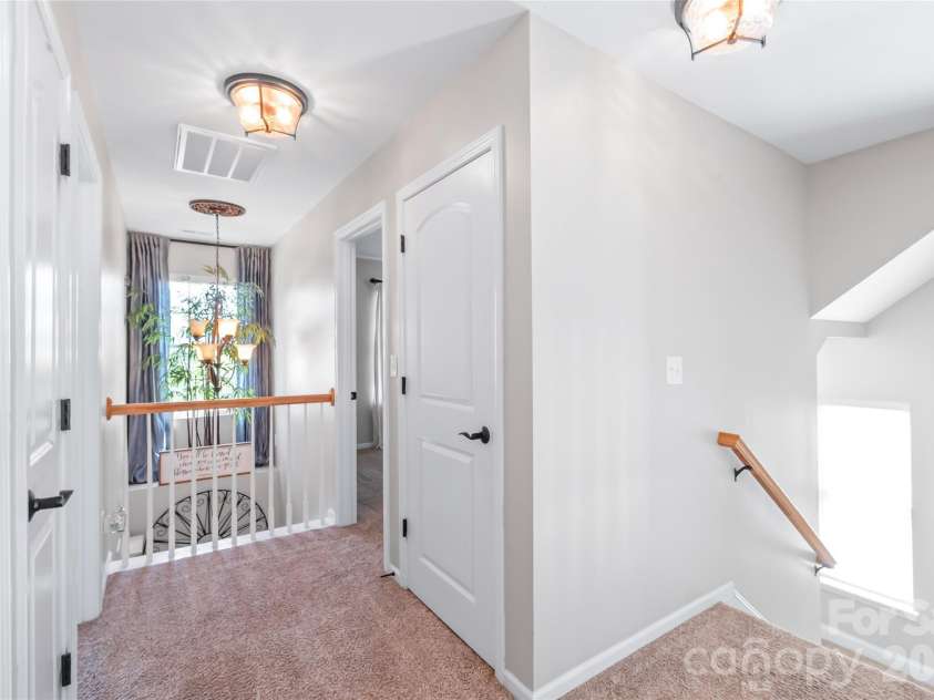 3327 Brackhill Street, Davidson, NC 28036.  MLS# CAR4418504, YatesRealty ID 52682. Entry to third floor with door