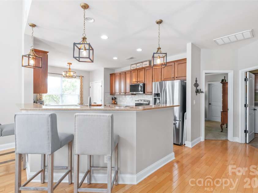 3327 Brackhill Street, Davidson, NC 28036.  MLS# CAR4418504, YatesRealty ID 52682. High counter with seating space overlooking the kitchen