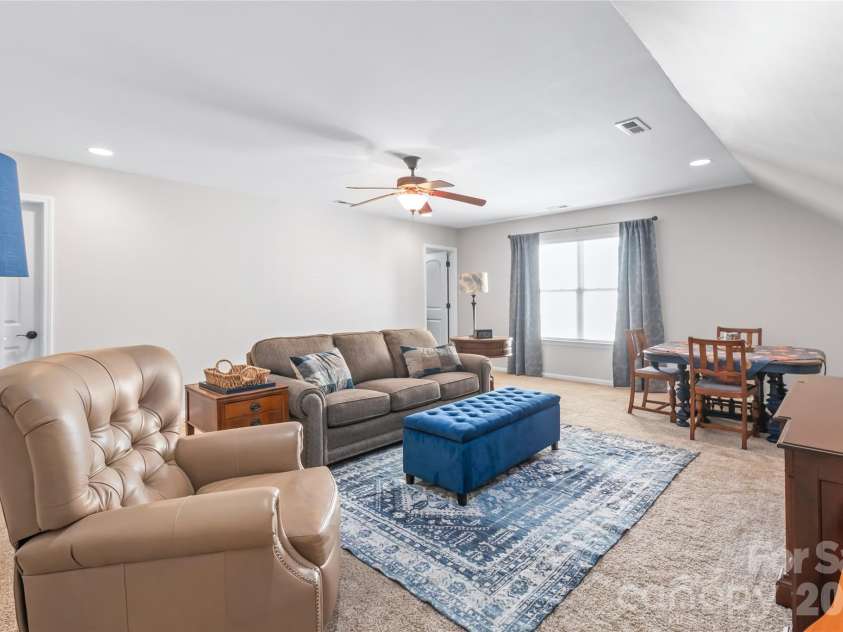 3327 Brackhill Street, Davidson, NC 28036.  MLS# CAR4418504, YatesRealty ID 52682. Huge second-floor living area. Also has a full bath and a walk-in storage closet - so many options