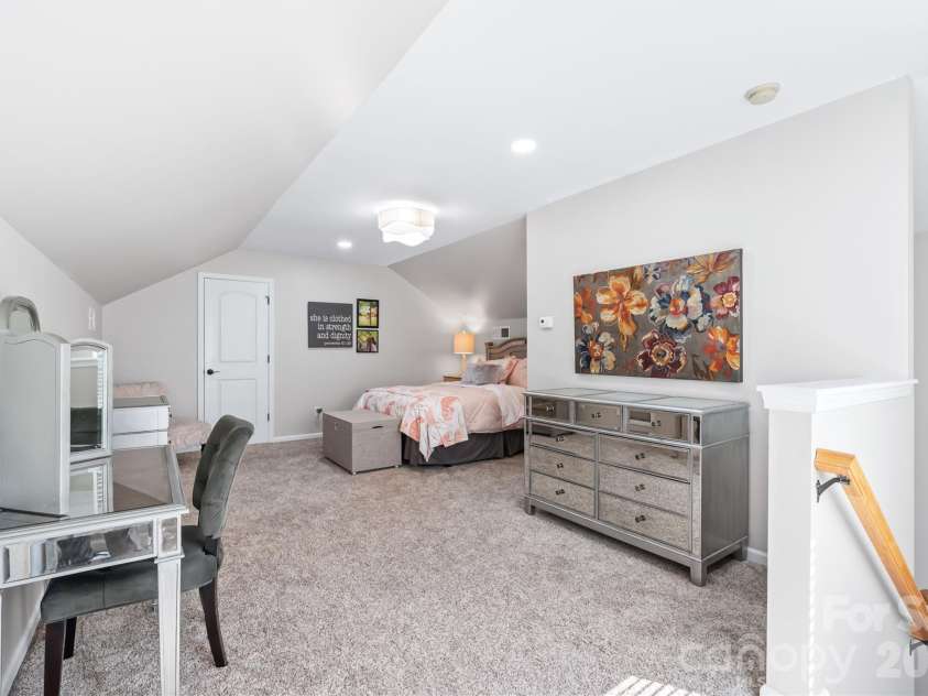 3327 Brackhill Street, Davidson, NC 28036.  MLS# CAR4418504, YatesRealty ID 52682. Third-floor bonus area. Currently a guest bed, but could be another office, play room, temp controlled storage, whatever you need