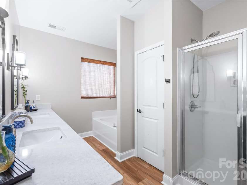 3327 Brackhill Street, Davidson, NC 28036.  MLS# CAR4418504, YatesRealty ID 52682. Updated primary bath with lots of couunter space and dual sinks
