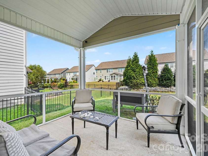 5710 Rainbow Lane, Indian Land, SC 29707.  MLS# CAR4423207, YatesRealty ID 52685. Screened-in patio offers comfortable relaxation