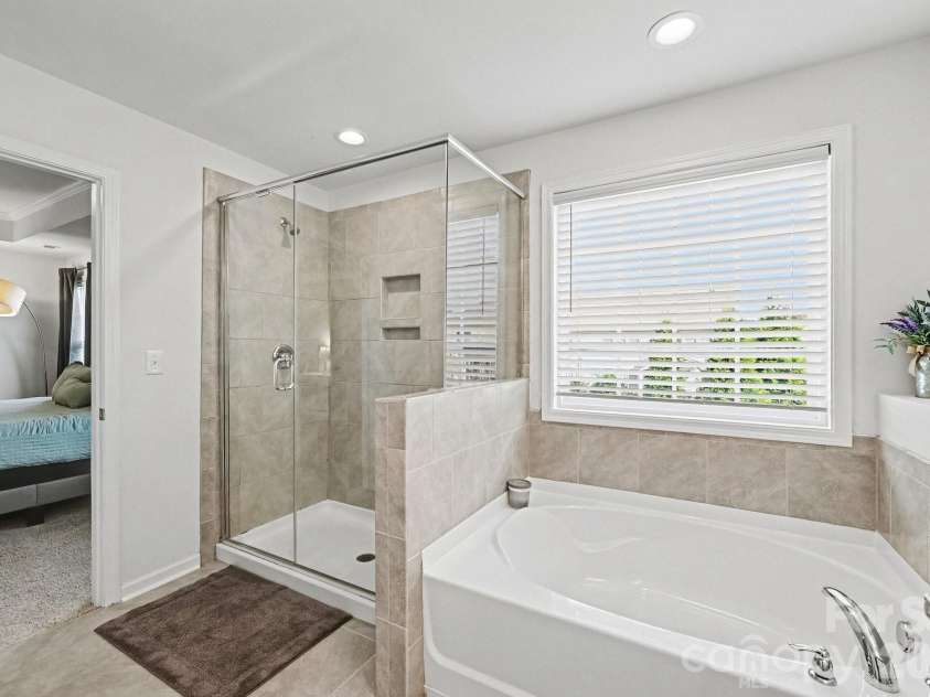 5710 Rainbow Lane, Indian Land, SC 29707.  MLS# CAR4423207, YatesRealty ID 52685. Spacious primary bathroom