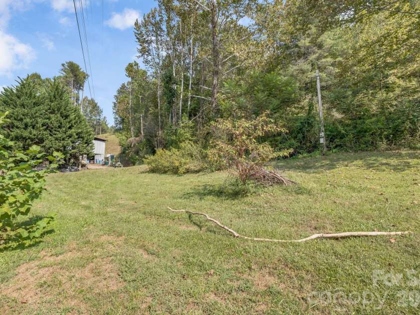 4078 NC 208 Highway, Marshall, NC 28753.  MLS# CAR4425810, YatesRealty ID 52688. Back yard