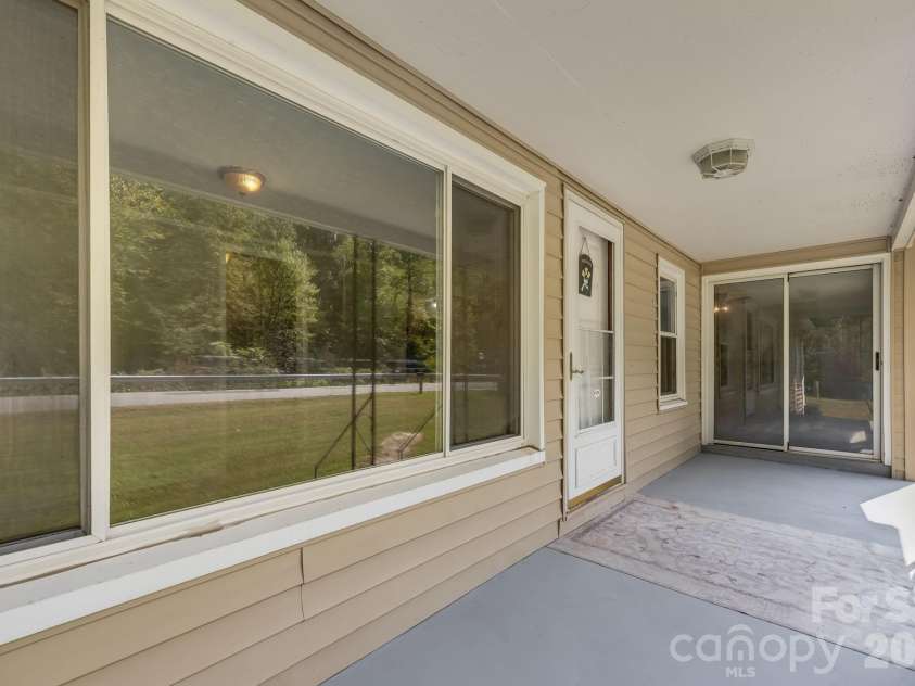 4078 NC 208 Highway, Marshall, NC 28753.  MLS# CAR4425810, YatesRealty ID 52688. Front porch