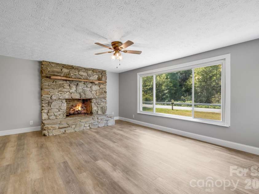 4078 NC 208 Highway, Marshall, NC 28753.  MLS# CAR4425810, YatesRealty ID 52688. Living room