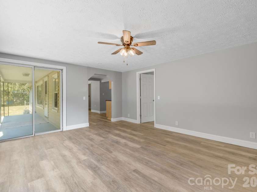 4078 NC 208 Highway, Marshall, NC 28753.  MLS# CAR4425810, YatesRealty ID 52688. Living room