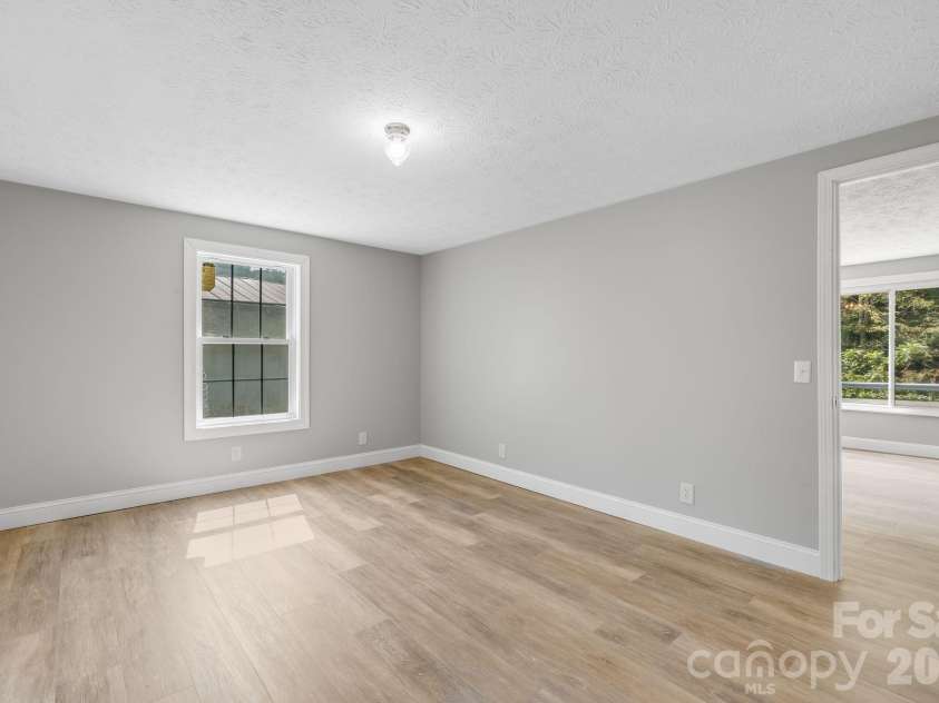 4078 NC 208 Highway, Marshall, NC 28753.  MLS# CAR4425810, YatesRealty ID 52688. Master Bedroom
