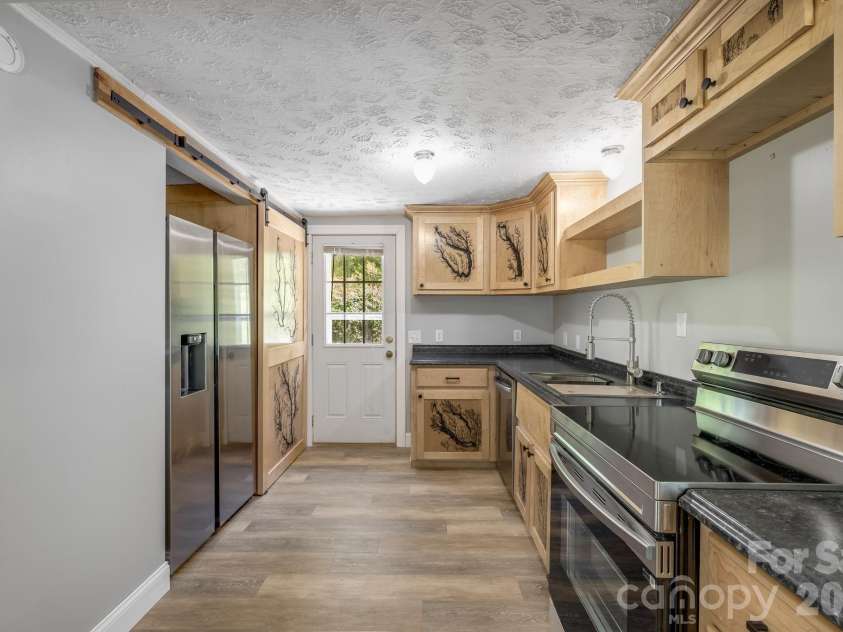 4078 NC 208 Highway, Marshall, NC 28753.  MLS# CAR4425810, YatesRealty ID 52688. New stainless applicances