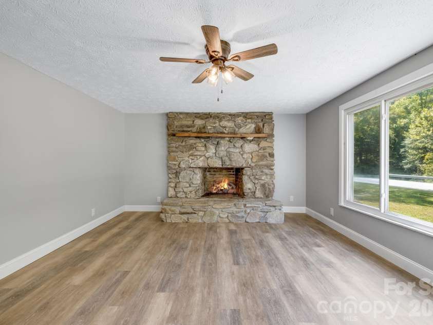 4078 NC 208 Highway, Marshall, NC 28753.  MLS# CAR4425810, YatesRealty ID 52688. Wood burning fireplace