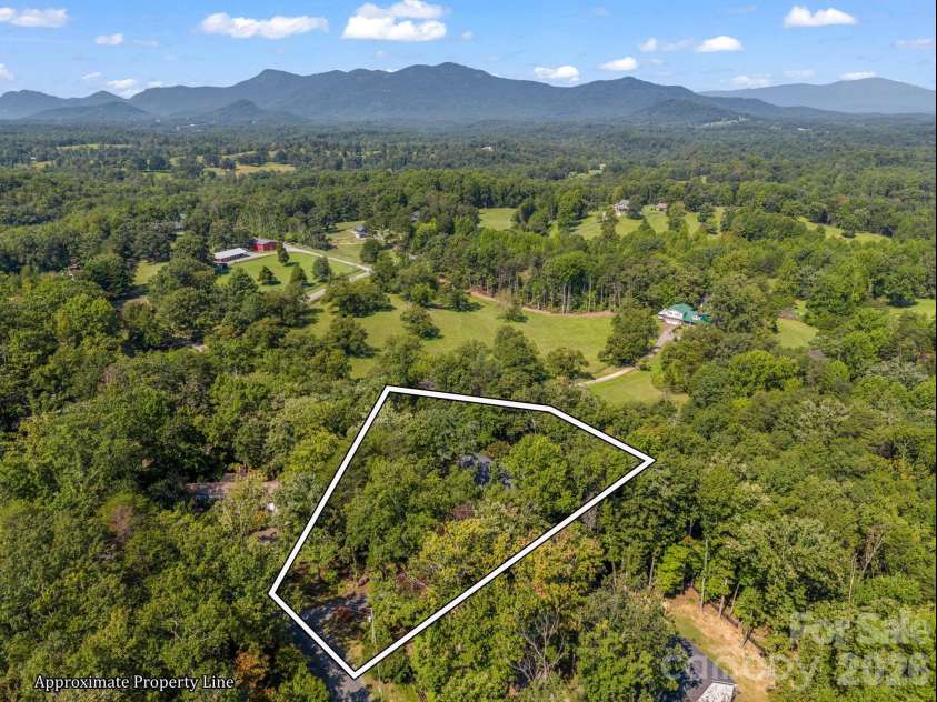 93 Dogwood Court, Tryon, NC 28782.  MLS# CAR4427590, YatesRealty ID 52692. .95 acres