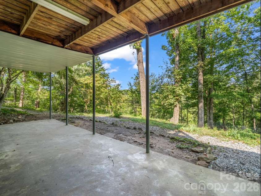 93 Dogwood Court, Tryon, NC 28782.  MLS# CAR4427590, YatesRealty ID 52692. Private back yard
