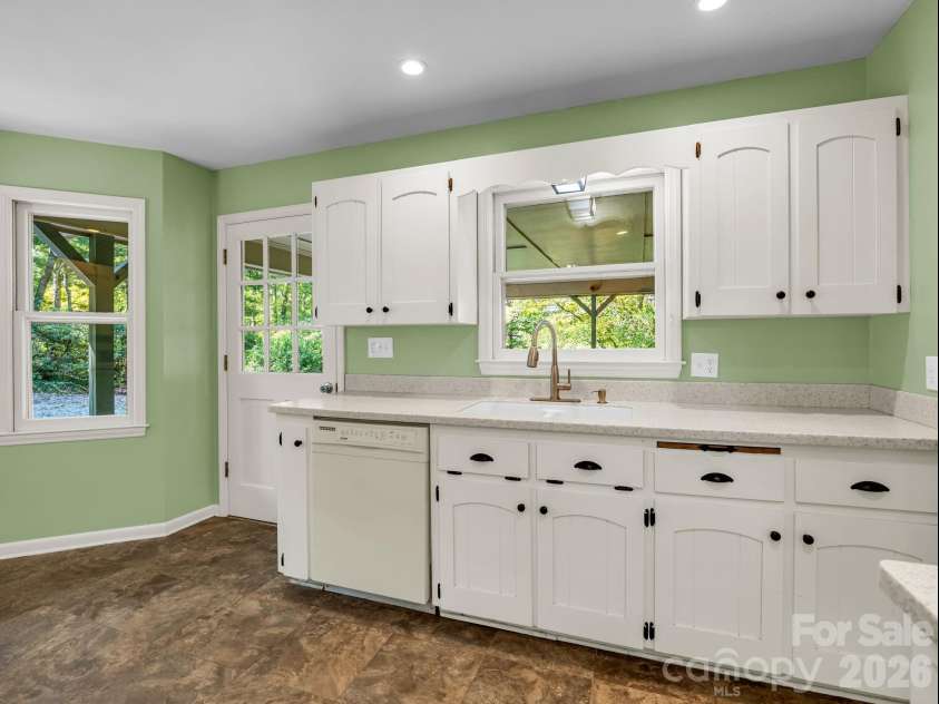 93 Dogwood Court, Tryon, NC 28782.  MLS# CAR4427590, YatesRealty ID 52692. Solid surface counter tops