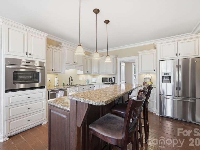 212 Scism Road, Kings Mountain, NC 28086.  MLS# CAR4406488, YatesRealty ID 52695. Entertaining made simple with the large breakfast/dining area, breakfast bar and open floor plan, all with farm views.