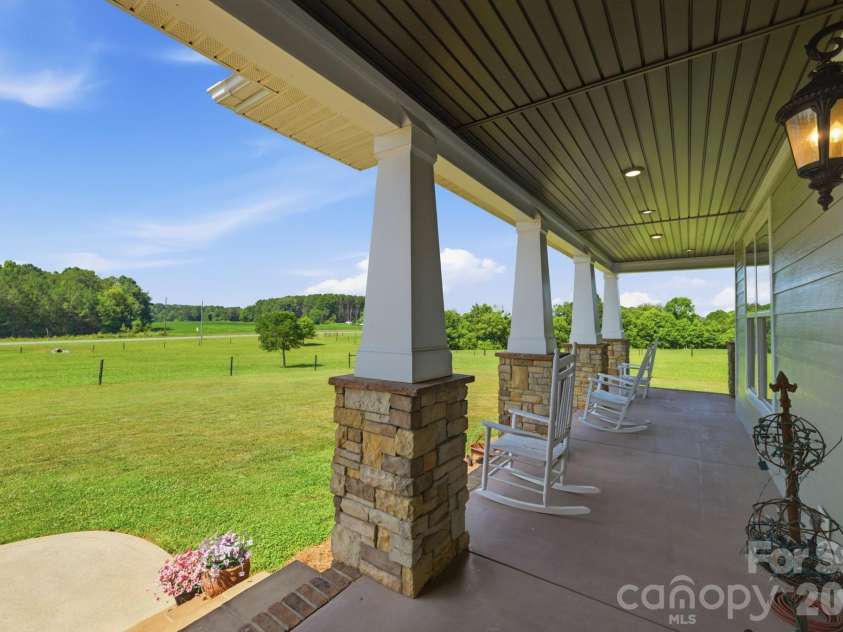 212 Scism Road, Kings Mountain, NC 28086.  MLS# CAR4406488, YatesRealty ID 52695. Stone accent columns along the front porch, hard board siding