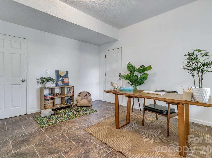 148 Stradley Mountain Road, Asheville, NC 28806.  MLS# CAR4425491, YatesRealty ID 52698. Maybe a play room!?