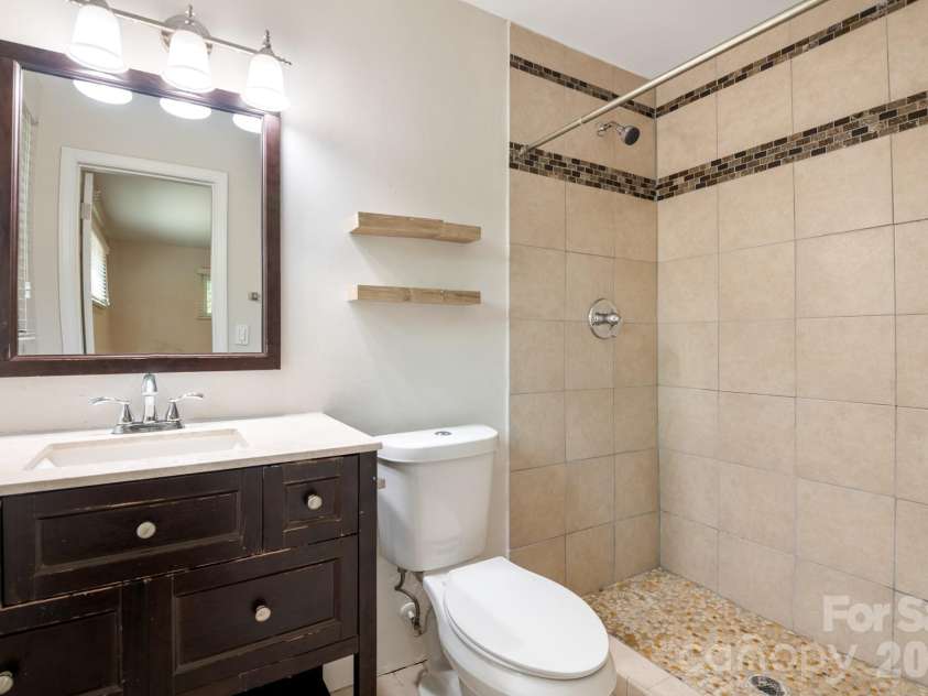 6414 Elmwood Circle, Charlotte, NC 28214.  MLS# CAR4424332, YatesRealty ID 52701. Primary Bathroom
