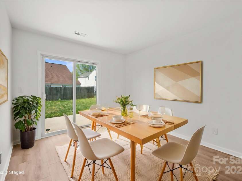 1409 Rheo Court, Concord, NC 28027.  MLS# CAR4245945, YatesRealty ID 5275. Flex space as dining room